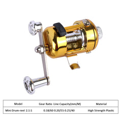 One gold and silver metal fishing reel with a black switch, labeled Mini Drum-reel 2.1:1 on a white background.